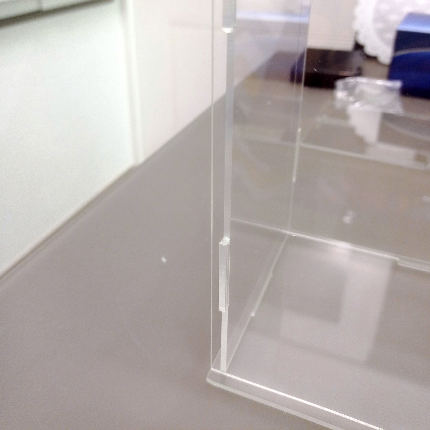 20 inches Tall Self-Assembled Acrylic Display Case With Clear Base